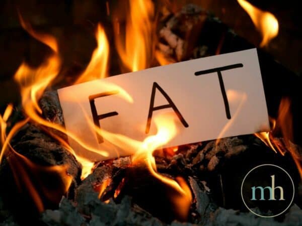 Burning fat on a fire.