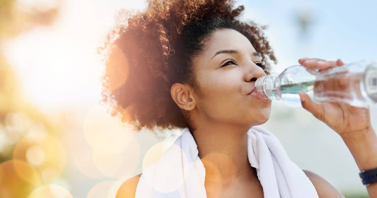 Woman drinking clean water for hydration